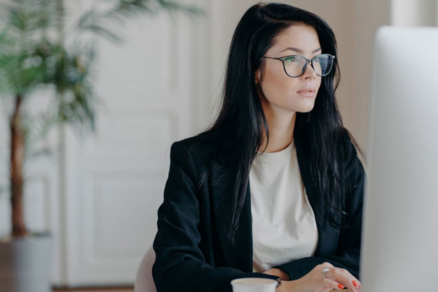 business woman looking at computer